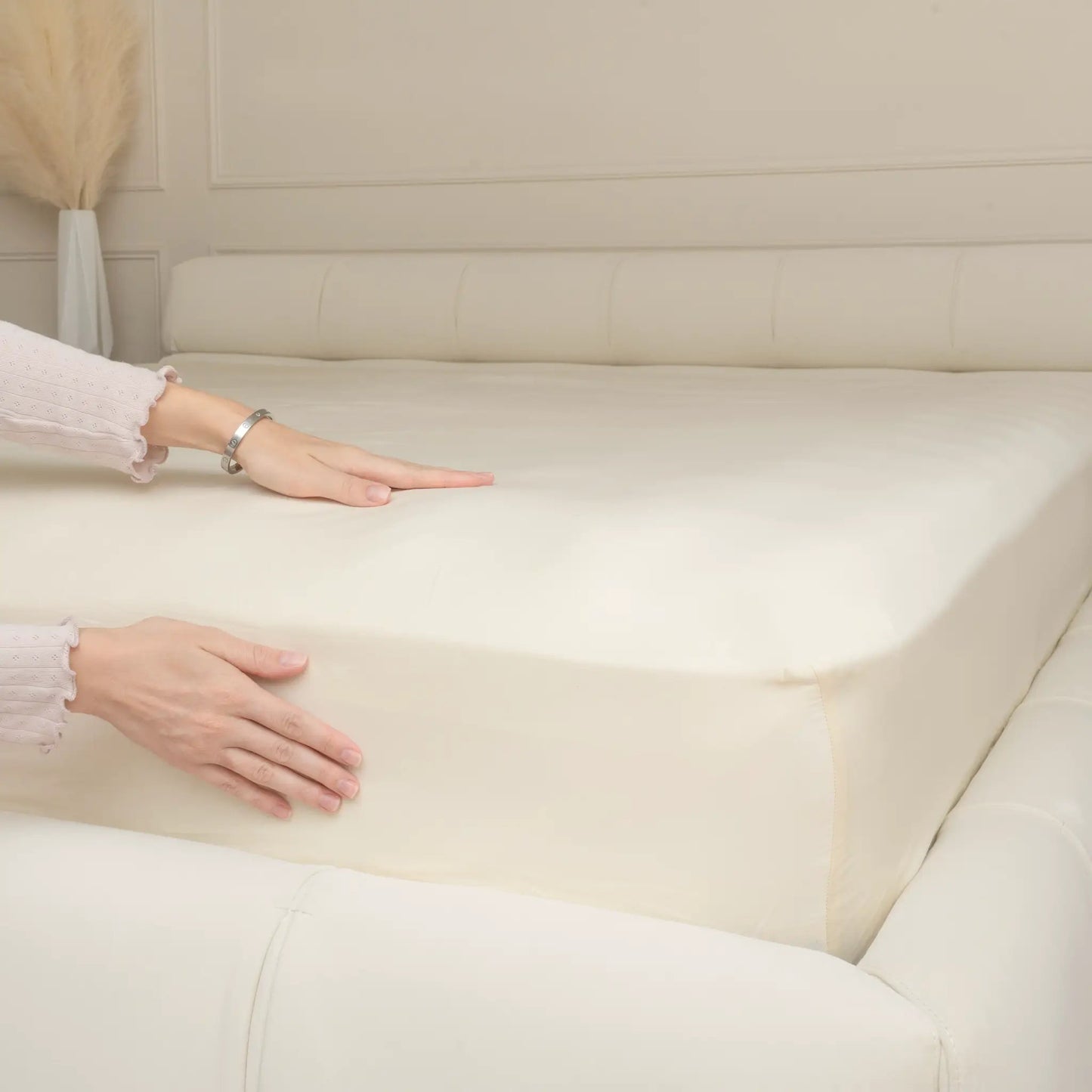 Organic Sateen Fitted Sheet by Organic Cotton Mart in ivory cream on bed on Tampa Home & Garden Store