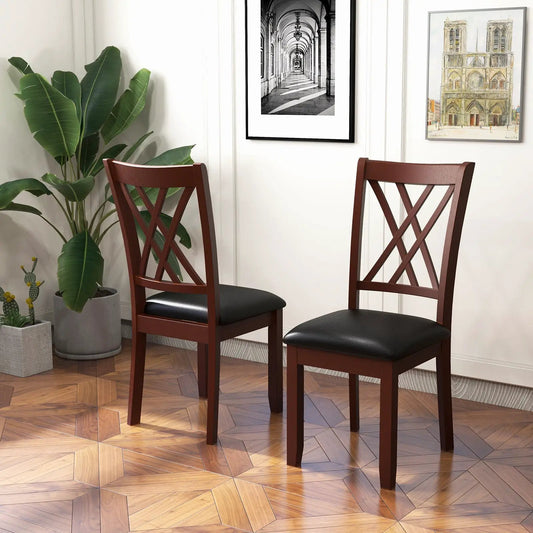 Set of 2 brown wood dining chairs with padded black seats and X-back lattice backs on Tampa Home & Garden Store