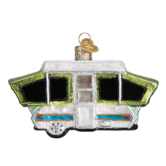 Old World Christmas popup tent camper ornament with glitter white body and lime-green trim on Tampa Home & Garden Store