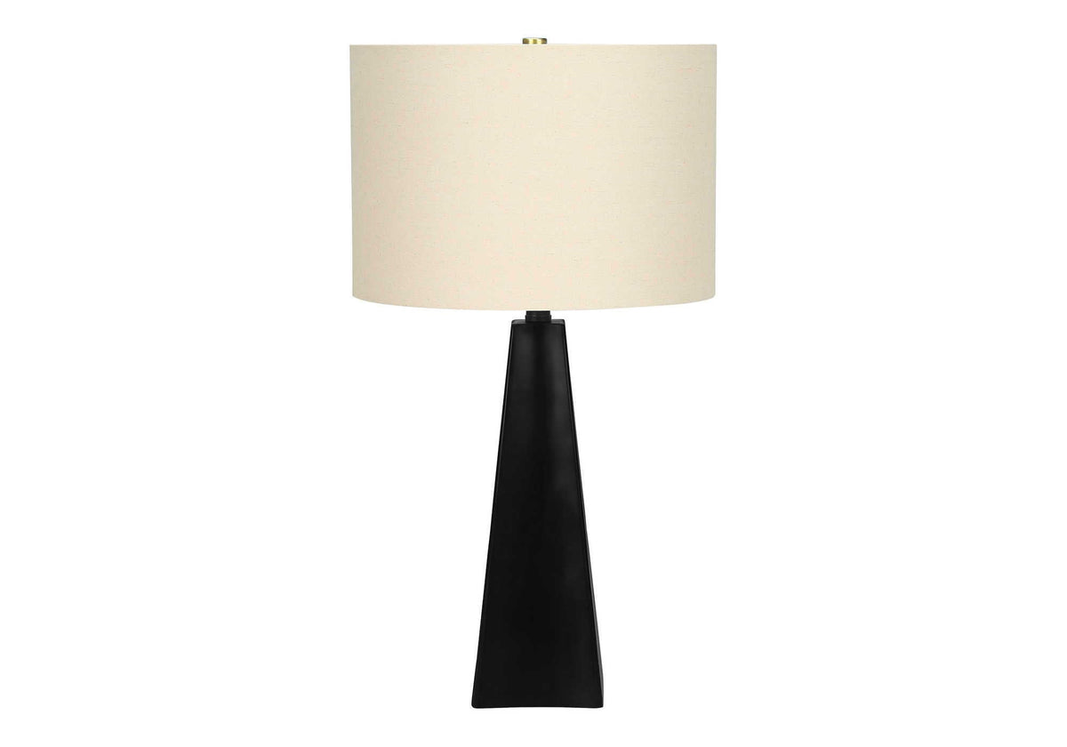 Table lamp with black resin base and beige fabric drum shade on Tampa Home & Garden Store