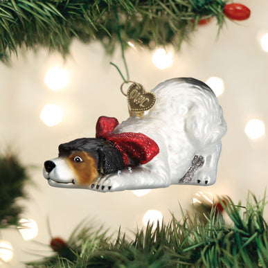 Norman Rockwell Signature Dog Ornament, white dog with red bow hanging on a Christmas tree on Tampa Home & Garden Store