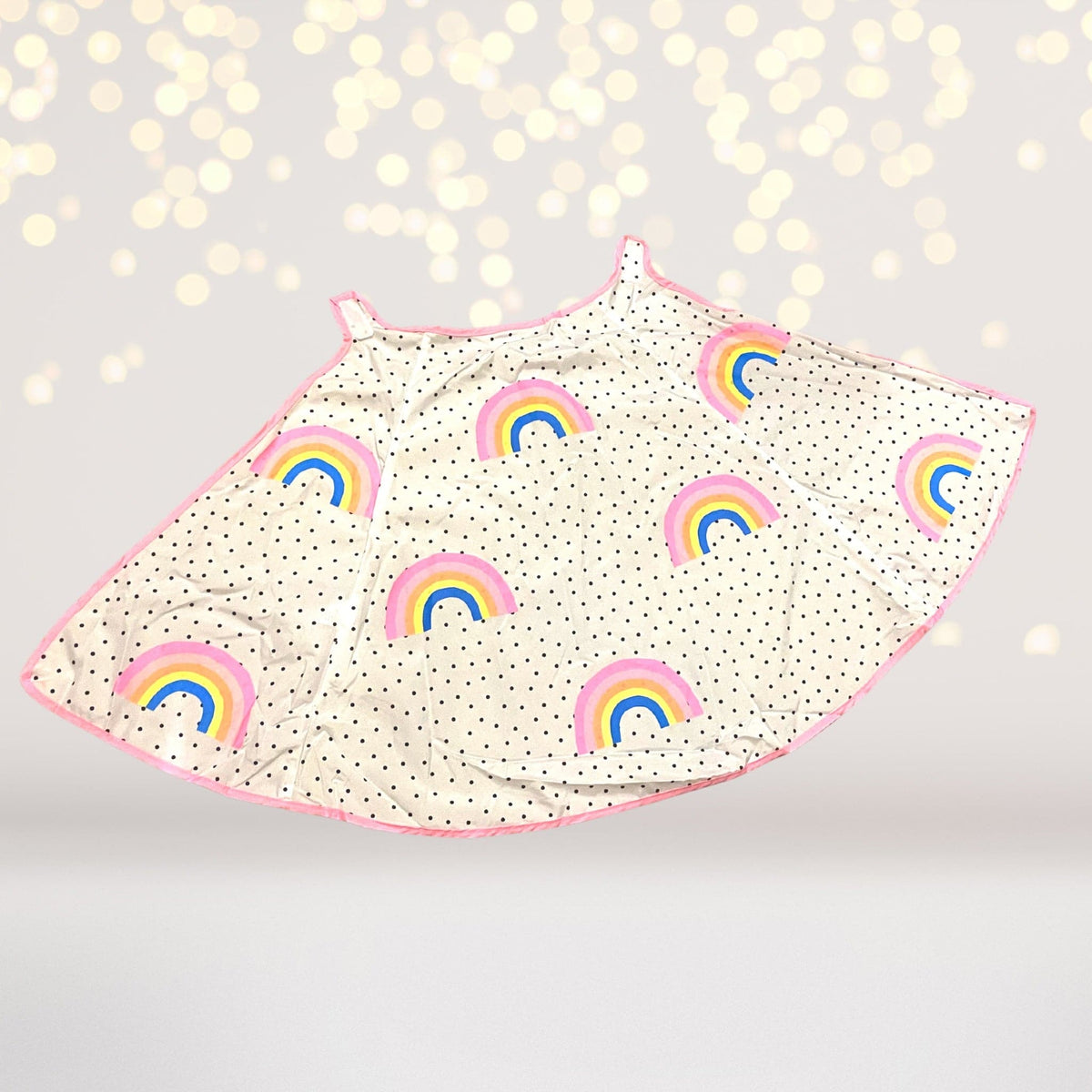 Kids Rainbow Superhero Cape, white polka dot fabric with pink edge and rainbow patches on Tampa Home & Garden Store