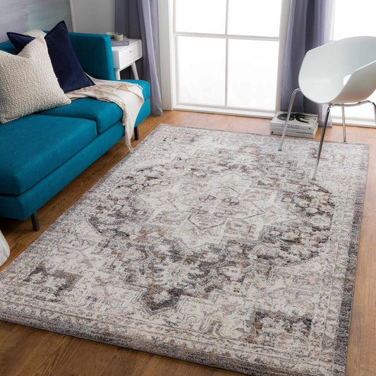 Cardston Thick Luxe Rug in Charcoal; plush abstract gray pattern under teal sofa on Tampa Home & Garden Store