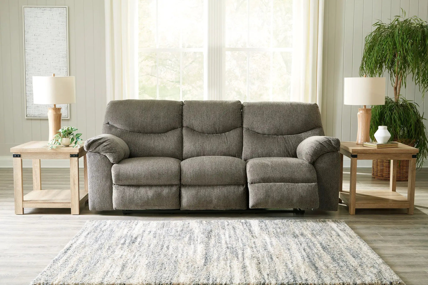 Alphons reclining sofa in gray fabric with plush cushions on Tampa Home & Garden Store