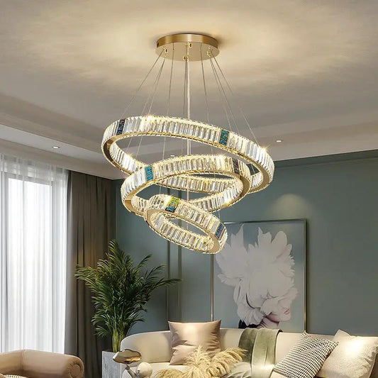 Round spiral steel crystal chandelier by Decorbites with gold-tone rings and clear prisms on Tampa Home & Garden Store