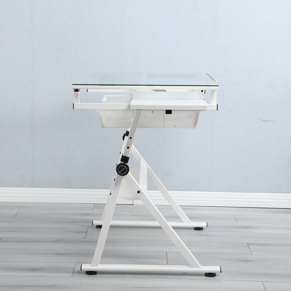 White adjustable drafting table with tempered glass top and mesh basket on Tampa Home & Garden Store