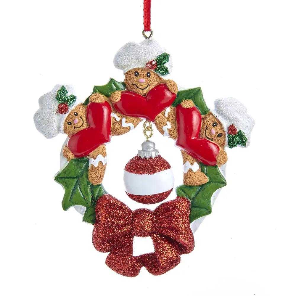 Gingerbread Wreath Ornament with three gingerbread figures, red hearts and glitter bow on Tampa Home & Garden Store