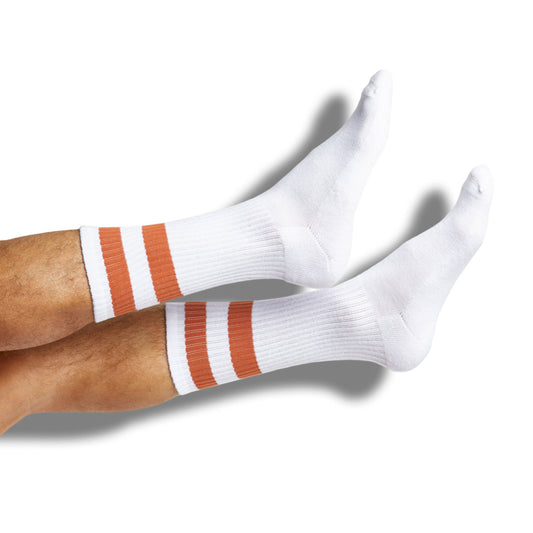 CiderOrange Mixed 4 Pack socks by DeadSoxy, white knit with orange striped cuffs, team colorways, 2 pairs visible on leg on Tampa Home & Garden Store