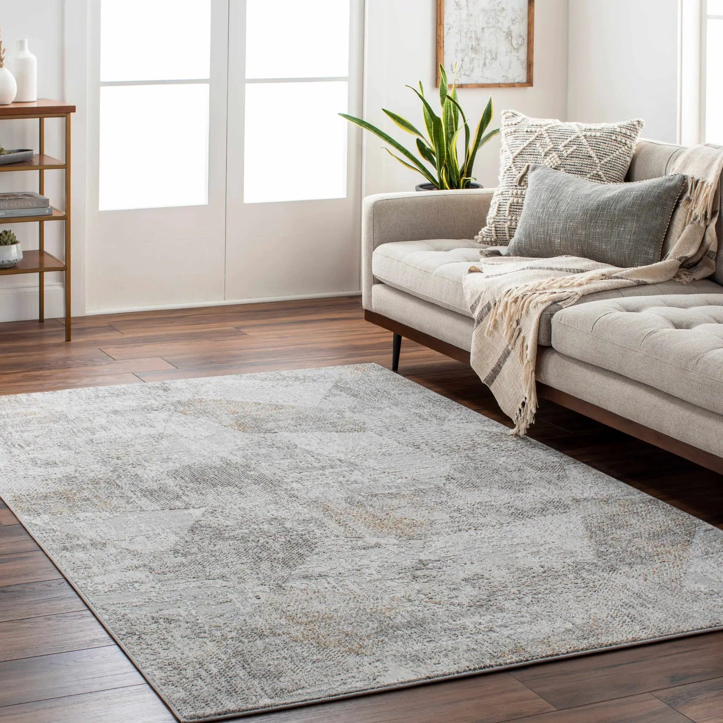 Cloudland Taupe Textured Luxe Area Rug with taupe textured pile in a cozy living room setting on Tampa Home & Garden Store