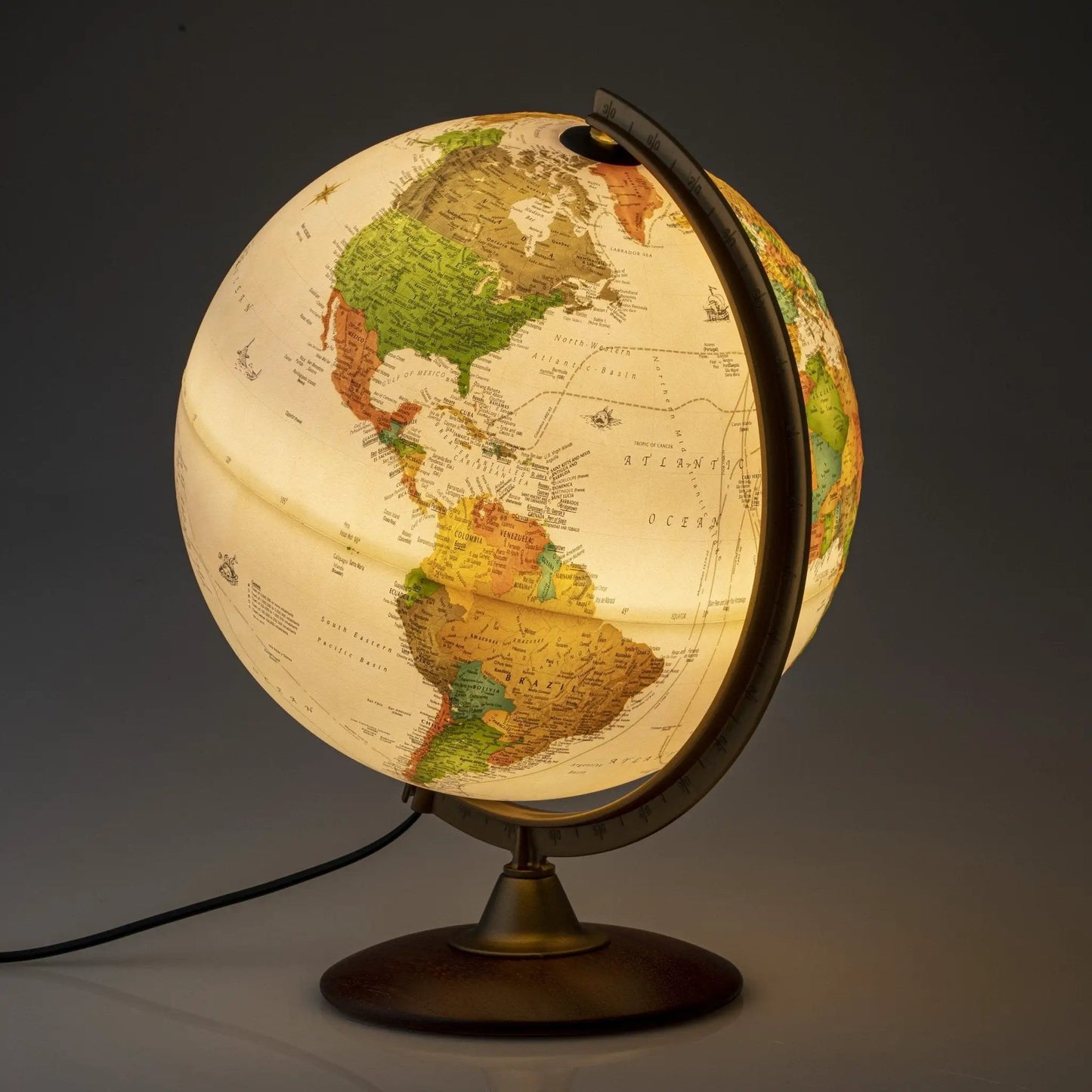 Colombo 12in raised-relief desk globe on wooden base with cream globe and colored landmasses on Tampa Home & Garden Store