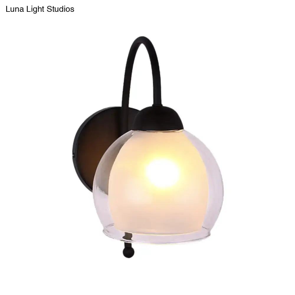 Black Frosted Glass Sconce by Decorbites with curved arm and round backplate, warm glow on Tampa Home & Garden Store