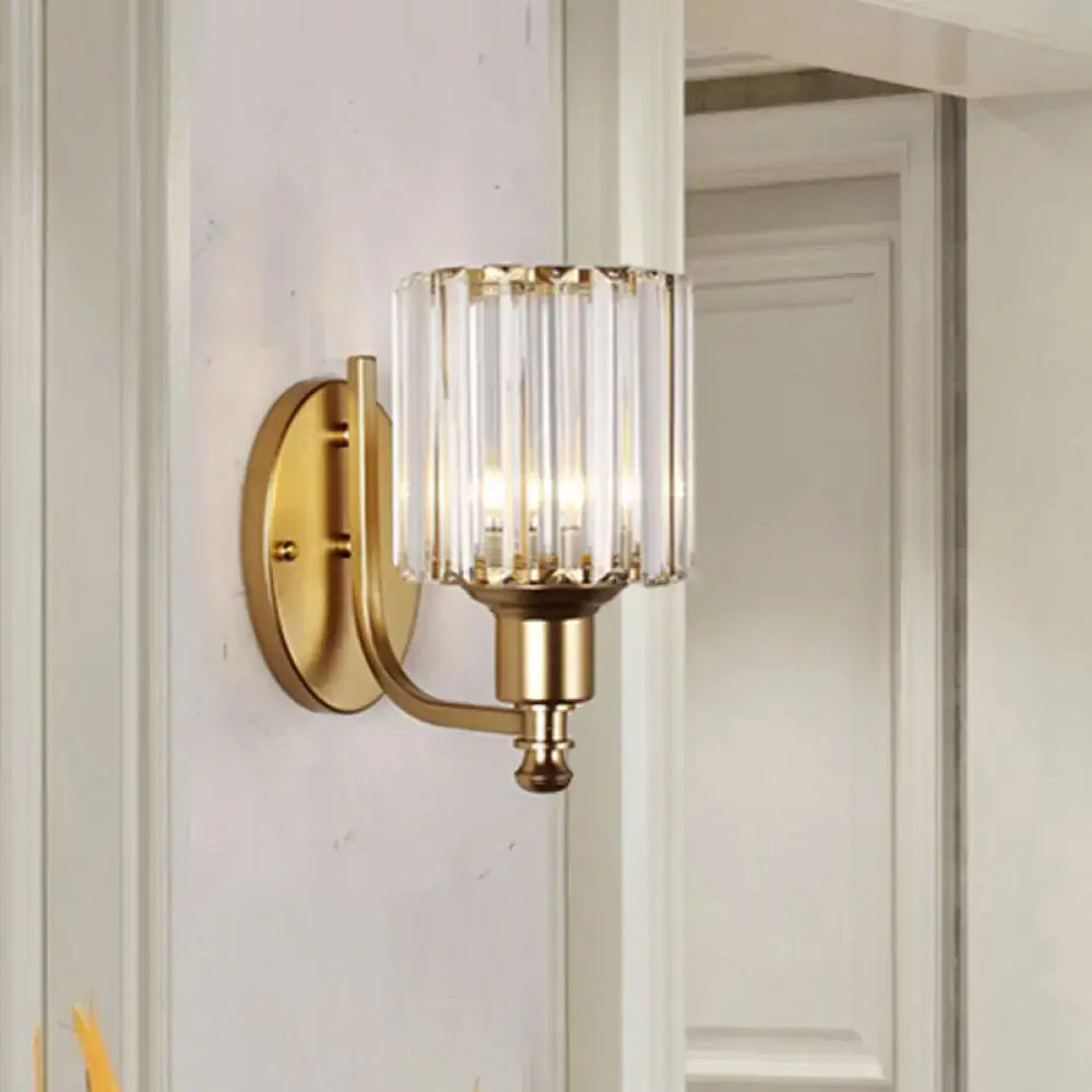 Black crystal sconce with brass-gold finish and clear glass shade by Decorbites on Tampa Home & Garden Store