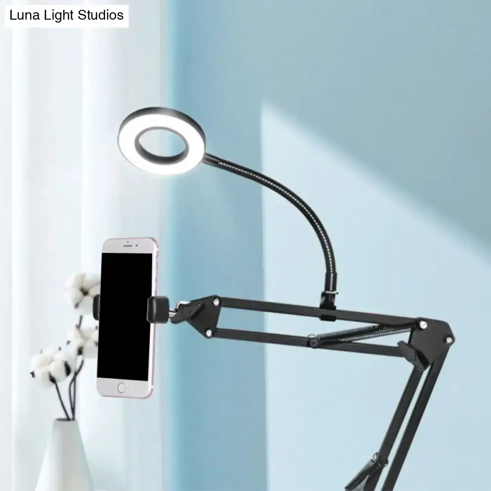 Black metal vanity lamp with ring light on an adjustable gooseneck arm on Tampa Home & Garden Store