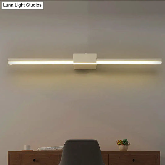 Decorbites white linear wall light with center block, modern LED fixture above desk on Tampa Home & Garden Store