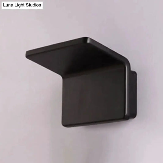 Contemporary black LED wall sconce with angled shade by Decorbites on Tampa Home & Garden Store