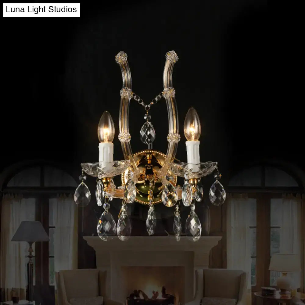 Amber Crystal Gold Accent Wall Light with hanging crystals and warm candle bulbs on Tampa Home & Garden Store