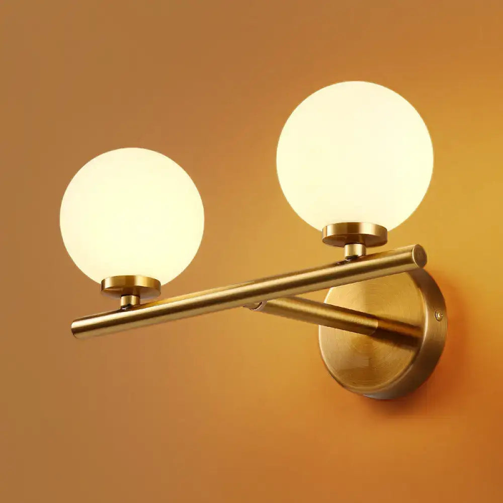 Gold White Glass Wall Light by Decorbites, brass finish, dual globe bulbs on Tampa Home & Garden Store