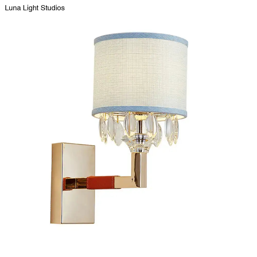 Gold crystal fabric shade sconce by Decorbites, wall mounted blue trim and crystal drops on Tampa Home & Garden Store