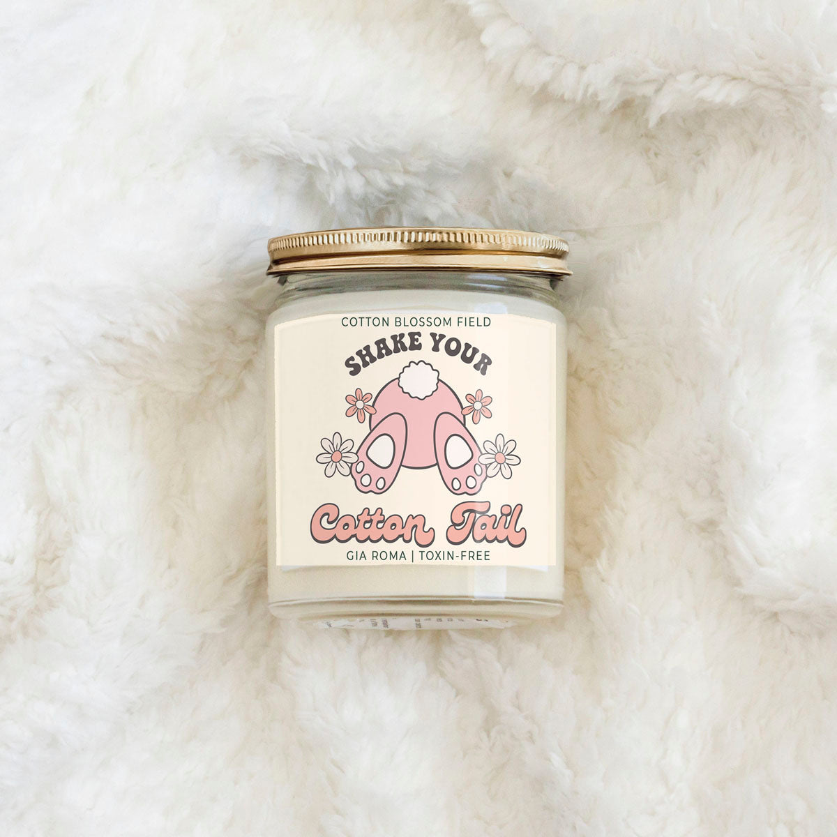 Cotton Blossom Retro Candle Gia Roma in a clear glass jar with a gold lid and pink label art on Tampa Home & Garden Store