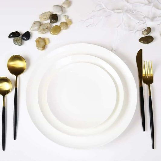 Angelic White Bread and Butter Plates set of 4, white ceramic with gold-toned flatware visible on Tampa Home & Garden Store