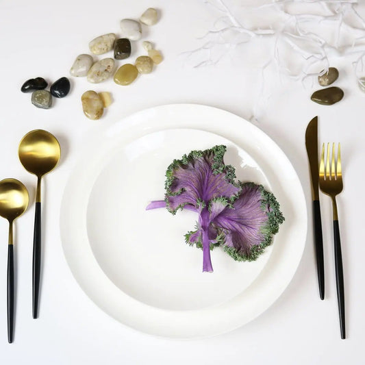 Angelic White Salad Plates Set of 4 with gold and black flatware and purple kale garnish on Tampa Home & Garden Store