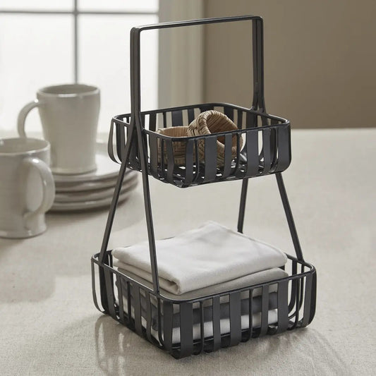 Spencer two-tier black metal napkin holder with top basket and bottom shelf for dining tables on Tampa Home & Garden Store