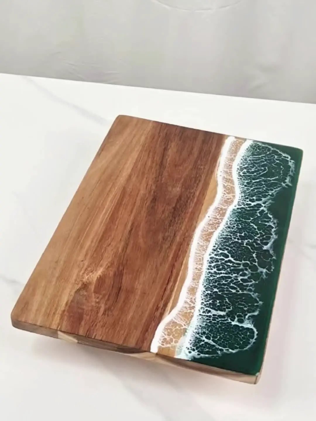 Acacia wood cutting board with teal resin wave edge Moktan Sabai on Tampa Home & Garden Store