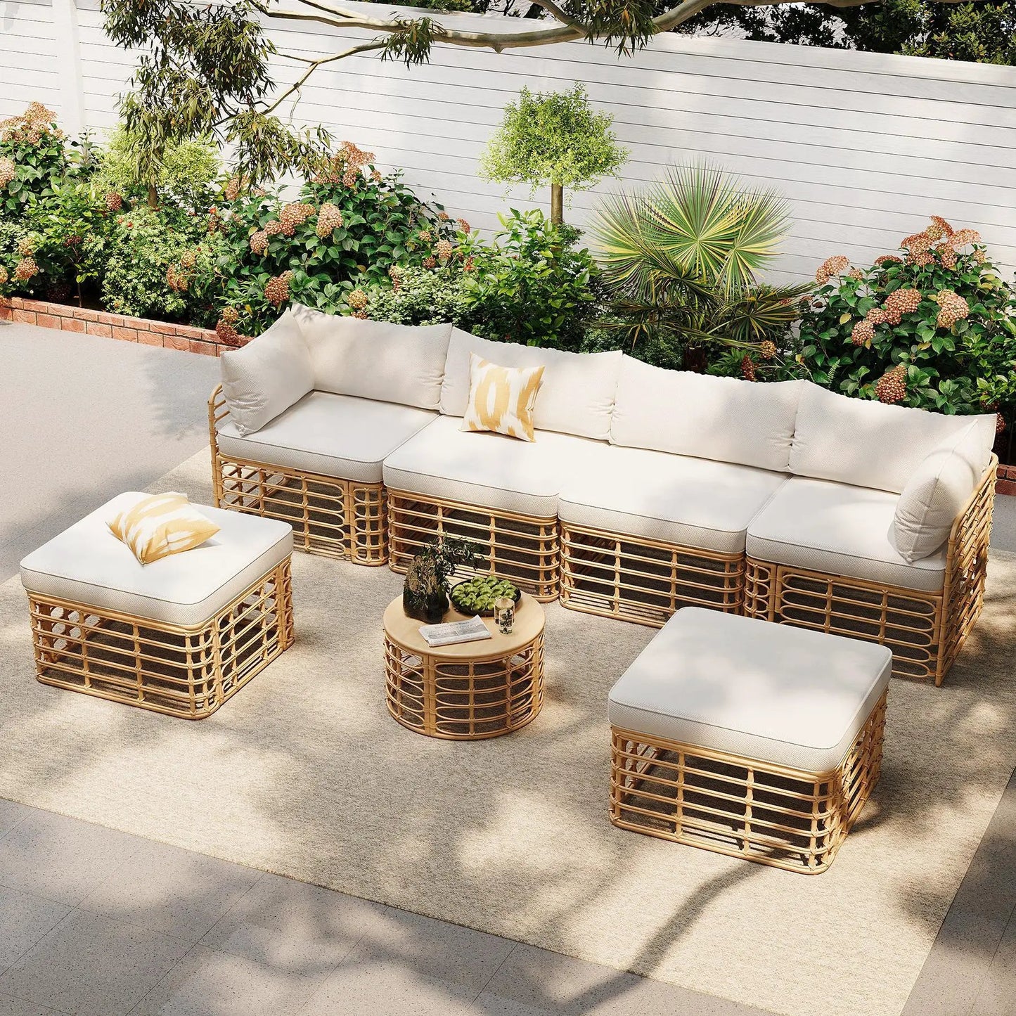 7-Piece outdoor rattan sectional sofa set with thick cream cushions and pillows on Tampa Home & Garden Store