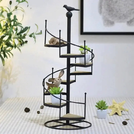 Black 8-layer iron spiral plant stand by Decorbites with small potted succulents on multiple levels on Tampa Home & Garden Store
