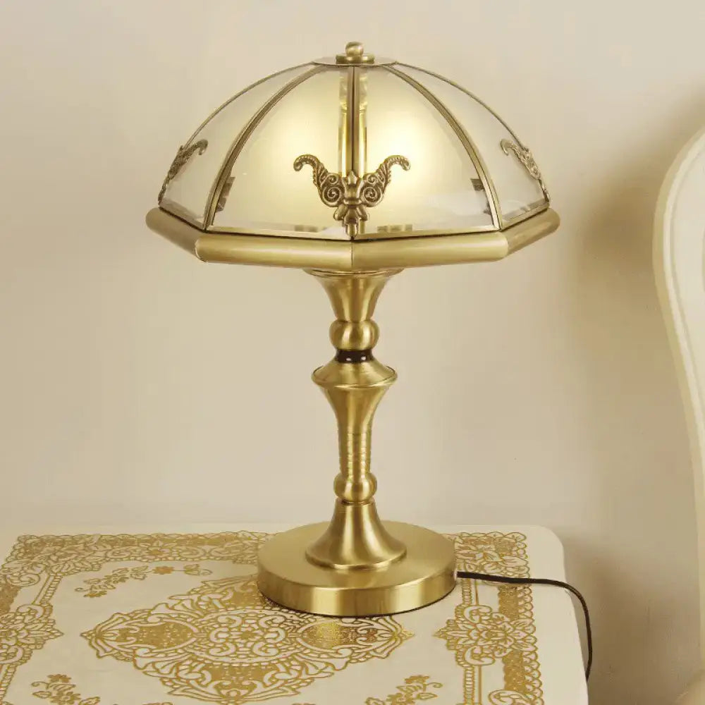 Brass frosted table lamp by Decorbites with glass shade and ornate stem on a lace table on Tampa Home & Garden Store