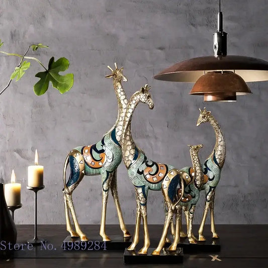 Teal and gold giraffe sculpture set of 3 by Decorbites for living room decor on Tampa Home & Garden Store