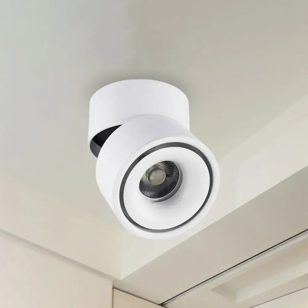 White round flush mount ceiling light by Decorbites with adjustable spotlight on Tampa Home & Garden Store