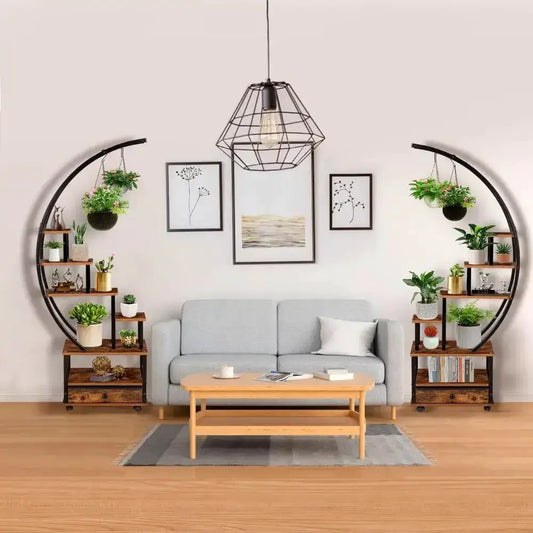 Half Moon Indoor Plant Stands in wood and metal with arches and shelves for plants beside a sofa on Tampa Home & Garden Store