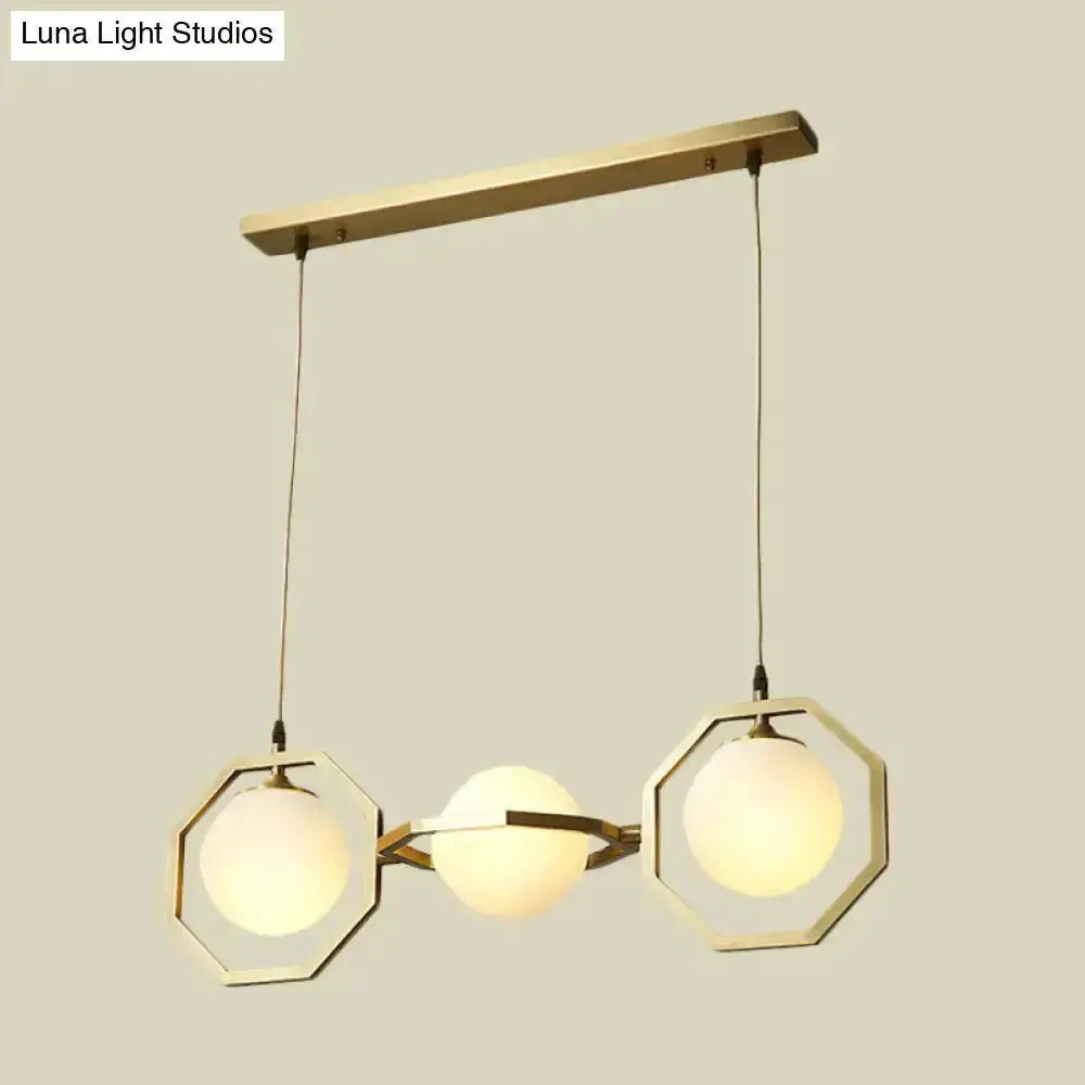 Modern gold octagon frosted glass orb pendant light for kitchen island by Decorbites on Tampa Home & Garden Store