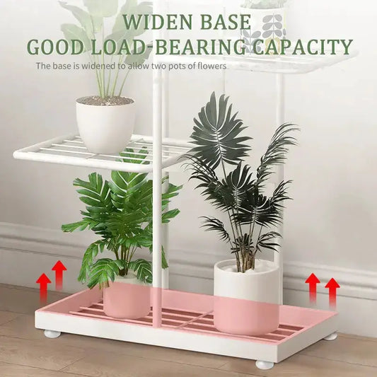 White tiered iron plant stand with pink base tray and two pots Decorbites on Tampa Home & Garden Store
