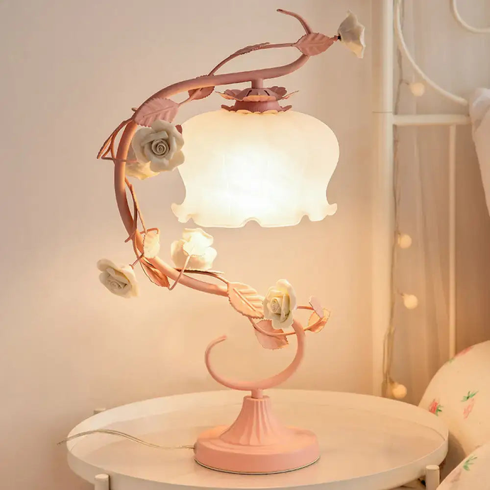 White glass rose table lamp with pink metal vine frame and sculpted roses on Tampa Home & Garden Store