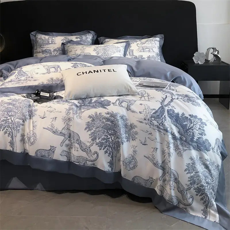 Decorbites blue eucalyptus duvet cover on bed with toile print, Chanel pillow on Tampa Home & Garden Store