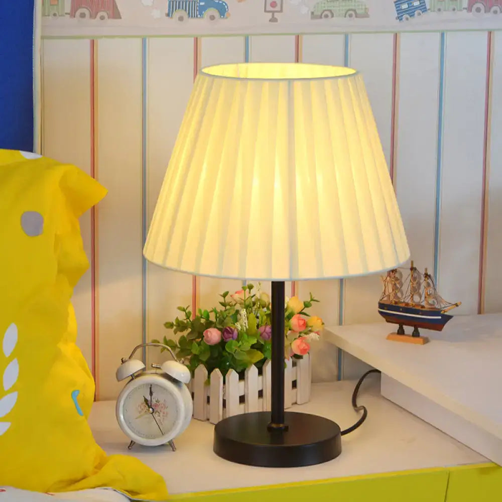 Cream Pleated Table Lamp by Decorbites with black base and cream shade on bedside table on Tampa Home & Garden Store