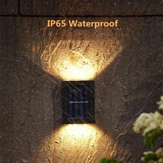 Black solar wall light by Decorbites, IP65 waterproof outdoor lighting fixture on Tampa Home & Garden Store