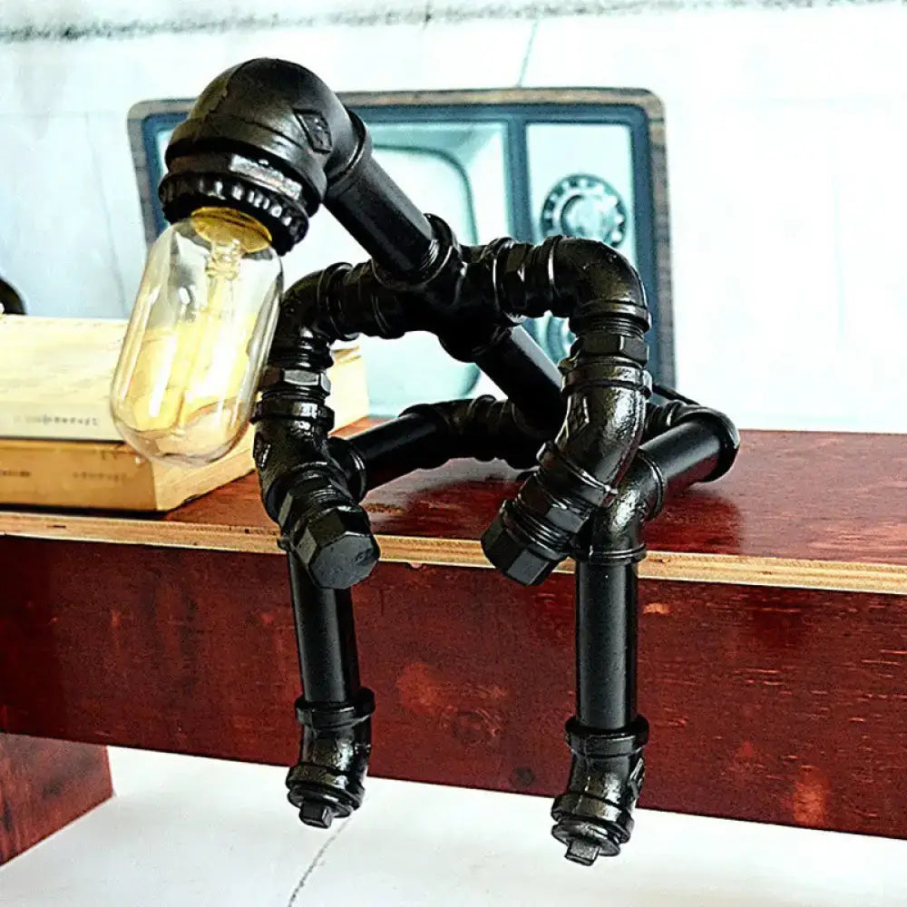Decorbites Black Steampunk Robot Lamp, black metal pipe construction with exposed bulb, on Tampa Home & Garden Store