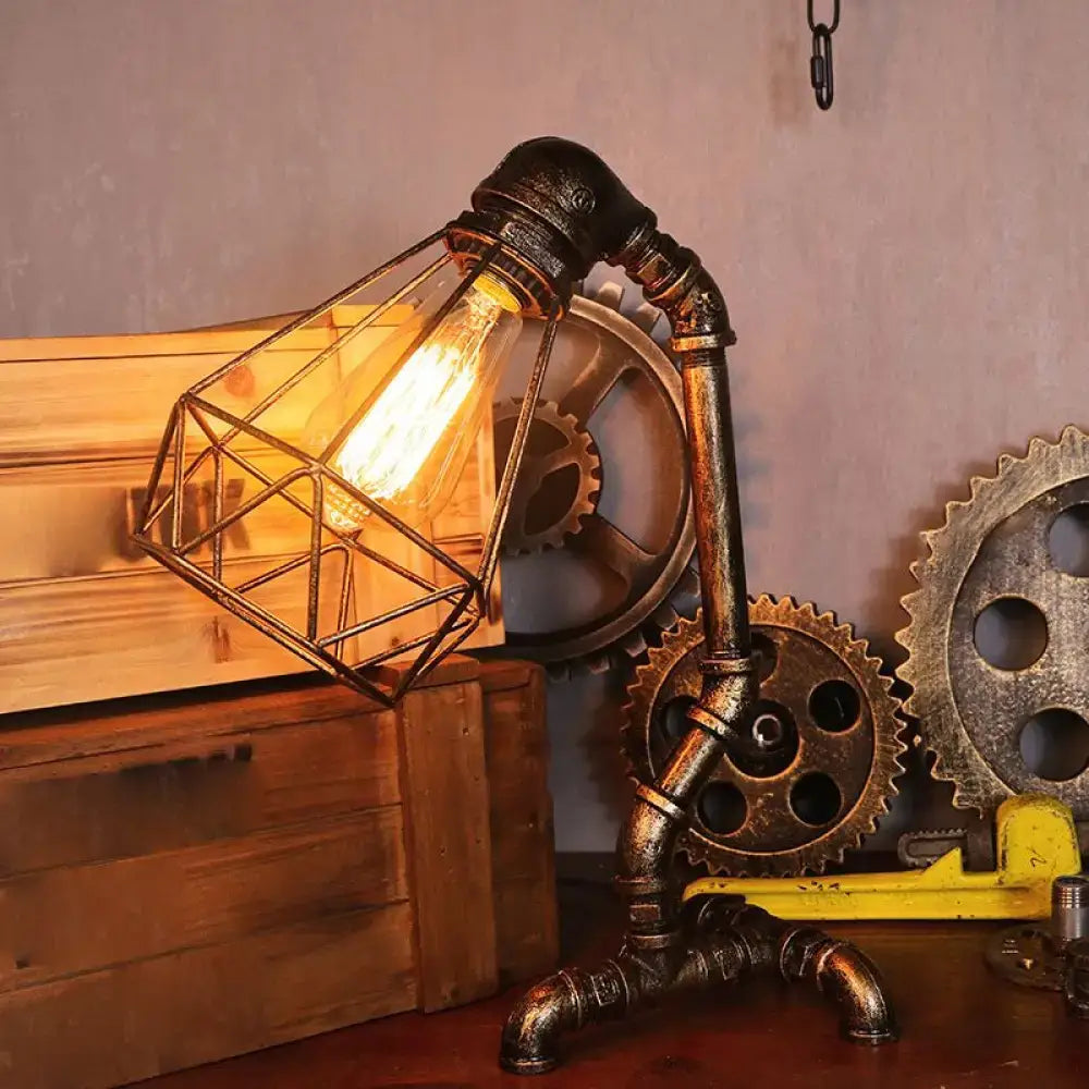 Bronze Steampunk Table Lamp Decorbites; pipe-base, geometric wire shade, Edison bulb on Tampa Home & Garden Store