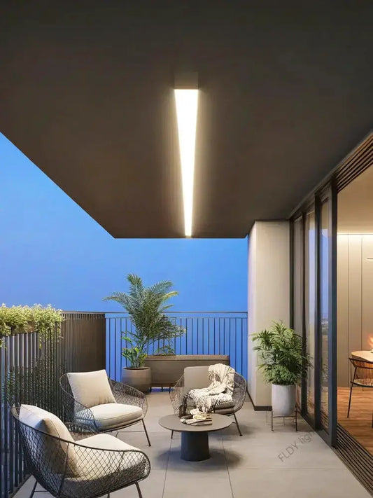 Waterproof LED Outdoor Wall Light Decorbites, slim vertical IP65 fixture with warm glow on Tampa Home & Garden Store