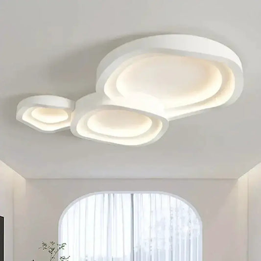 Minimalist white LED ceiling lamp with sculptural oval rings, ceiling-mounted on Tampa Home & Garden Store