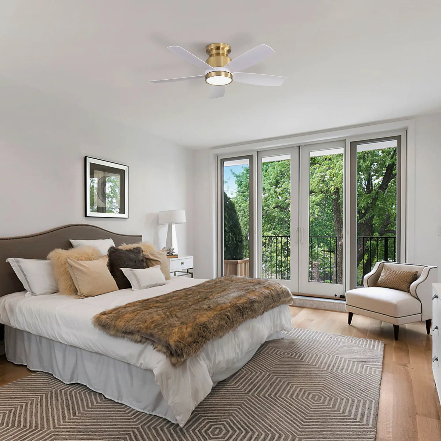 Flush mount ceiling fan with LED light, brass body and white blades, remote control on Tampa Home & Garden Store