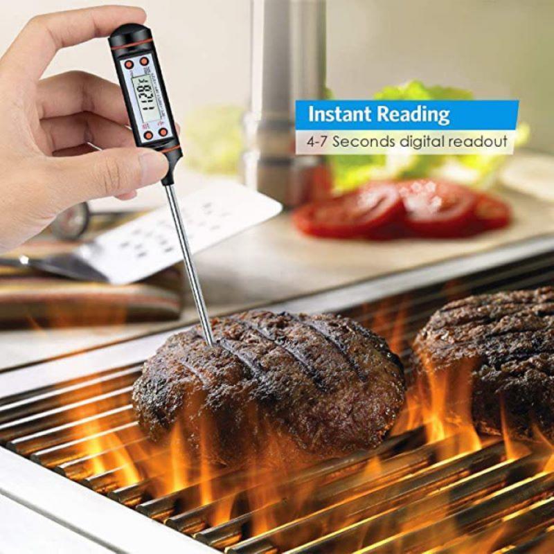 Stevvex digital meat thermometer with stainless probe used on two burgers at the grill on Tampa Home & Garden Store