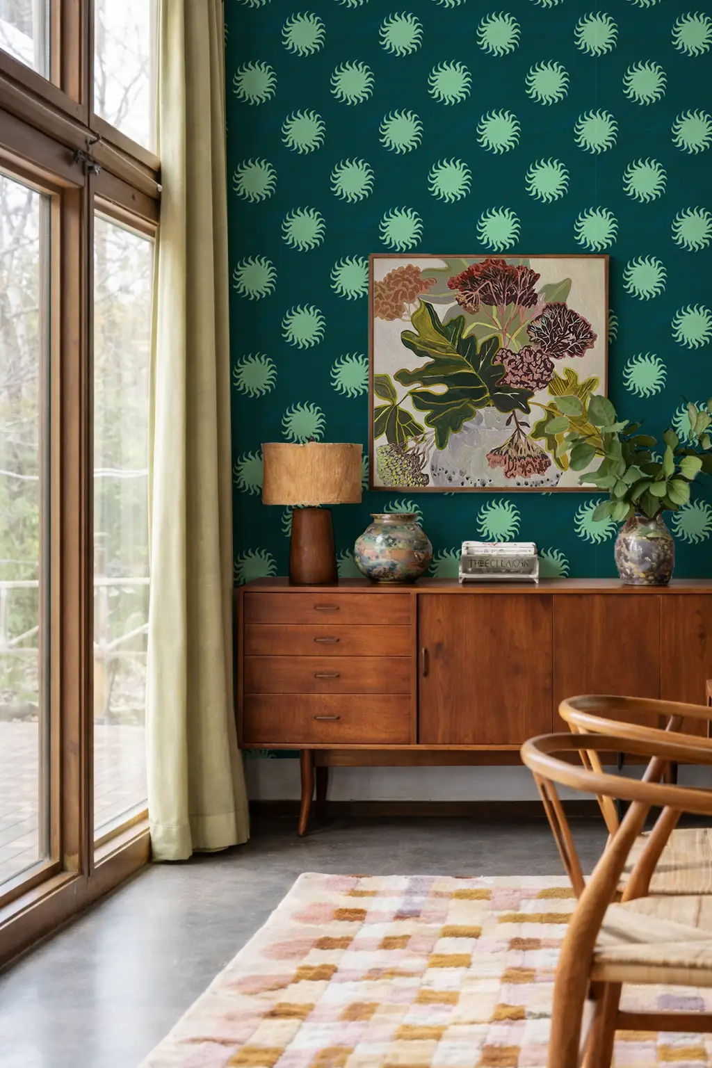 Sol Wallpaper Teal and Mint with sunburst motif on teal wall in a vintage living room on Tampa Home & Garden Store