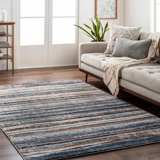 Dumaguil Thick Luxe Rug blue and navy in living room setting Boutique Rugs on Tampa Home & Garden Store