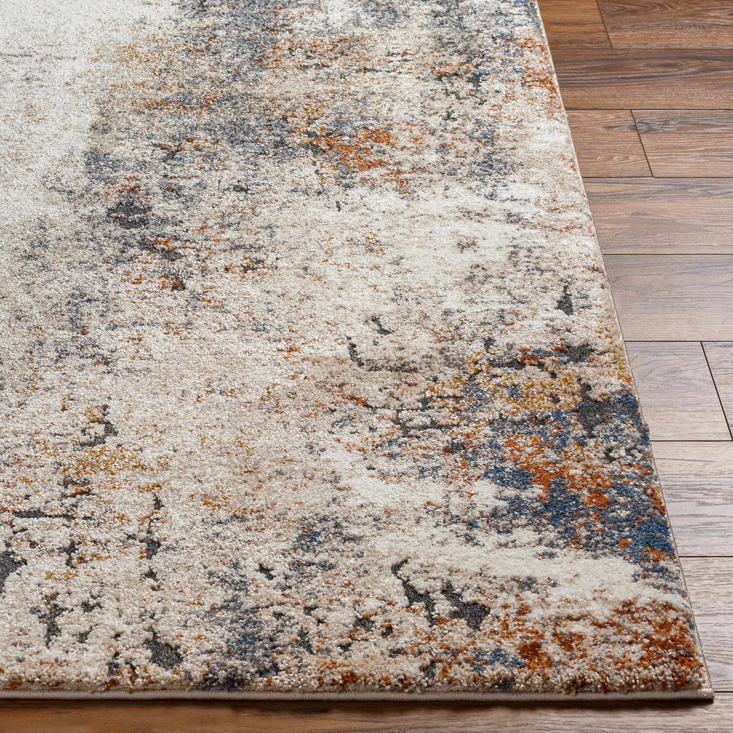 Donar Thick Luxe Rug Ivory Charcoal by Boutique Rugs with ivory gray speckling on wood floor on Tampa Home & Garden Store