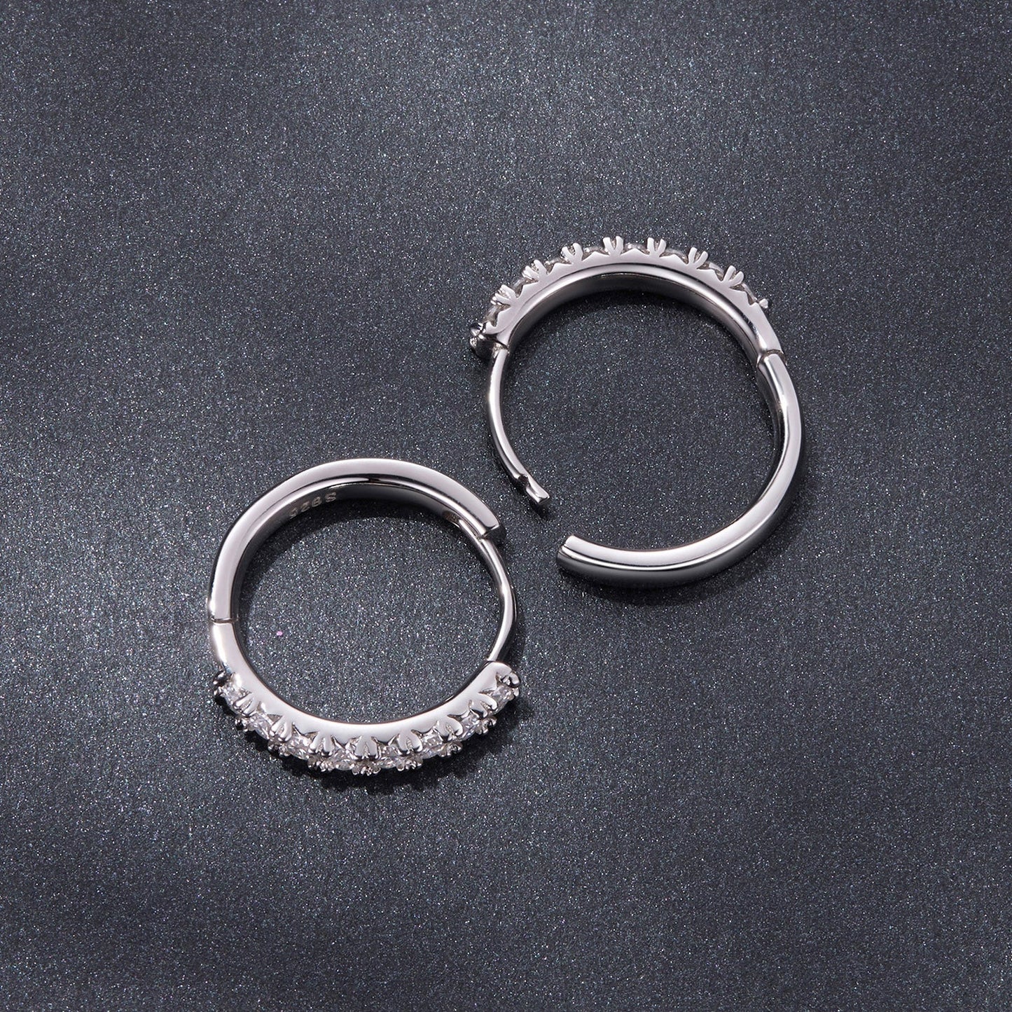 Pair of 925 silver moissanite earrings, 1.6cm hoops, one plain and one pave-stone on Tampa Home & Garden Store