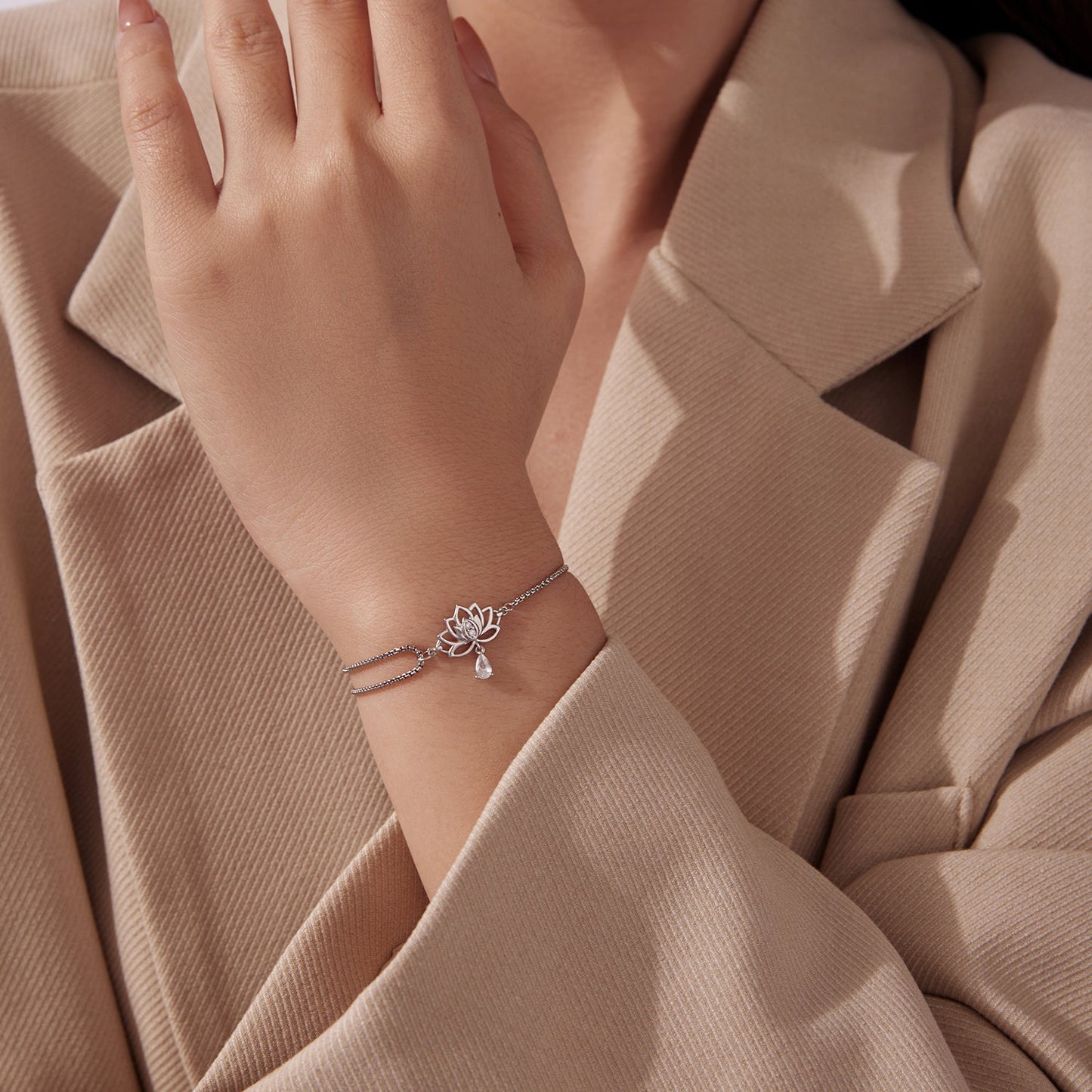 Sterling silver adjustable bracelet with lotus charm and CZ, white gold plated by Bids.com on Tampa Home & Garden Store
